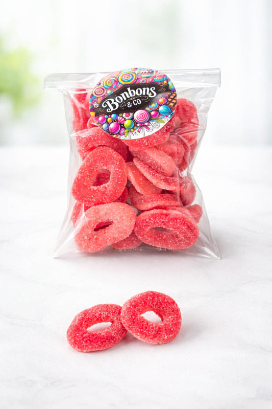 Anneaux fraise acidulés 100 grs